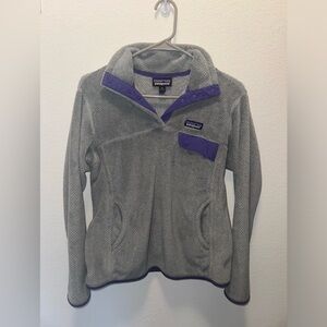 Women’s Patagonia dark gray with purple accent quarter sweatshirt size medium